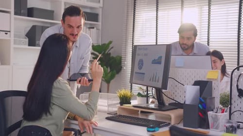 Group of Asian businessman and businesswoman working in the office.