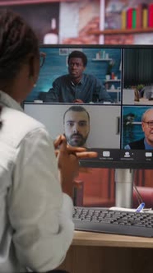 Vertical Video Remote Worker in Home Office Saluting Coworkers During Internet Videocall