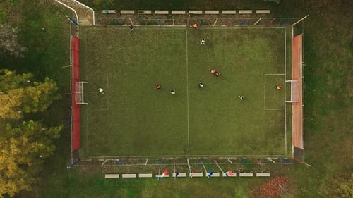 Aerial Drone View of Soccer Match on Outdoor Football Field