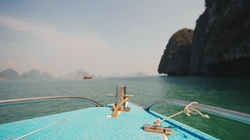 View of Stern of Boat Floating in Sea Tourists Sail on a Boat on Kayaks on Paddle Boards in the