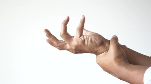 Slow Motion of Man Suffering Pain in Hand Close Up