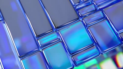 Blue Glass Tiles with Smooth Rounded Edges Creating an Abstract Geometric Pattern Rotating and