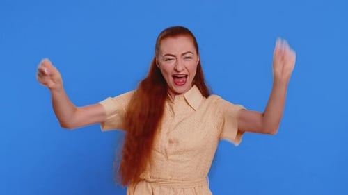 Excited Woman Celebrates and Gives Thumbs Up