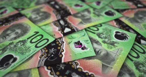 100-Dollar-Banknote fliegt über die Geldoberfläche