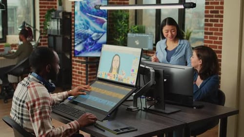 Team of Professionals Working in Modern Tech Office