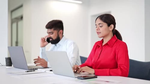 Indian Business Professionals Working In Office