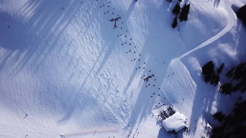 Aerial view of a ski slope in a ski resort in the Tyrolean Alps in Austria