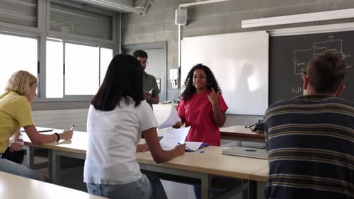 Hispanic Latin High School Student Girl Giving a Presentation to Her Classmates