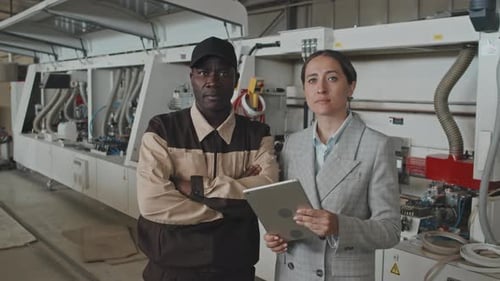 Portrait of Multiethnic Factory Manager and Worker