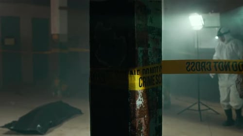 Investigators Taping Off Crime Scene at Night