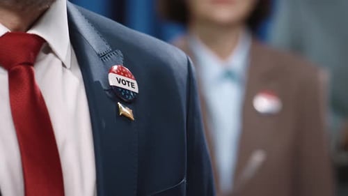 Vote Pin on Suit During American Election