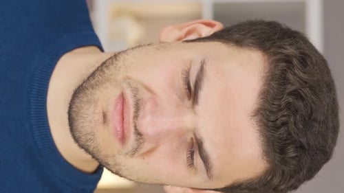 Vertical Video of The man with bad breath.