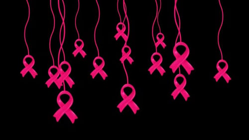 Pink Ribbons Hanging and Swaying for Breast Cancer Awareness