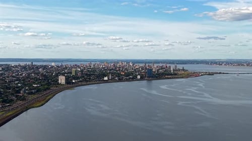 High and wide above the Paraná River, framing the entire city of Posadas, Misiones, Argentina