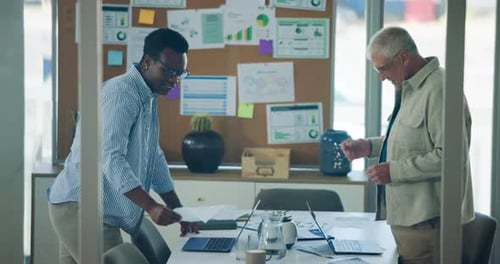 Paperwork, graphs and business people with meeting for budget, finance review