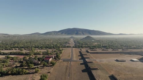 Drone Shot Of Teotihuacan City of Gods, Aztec Pyramids, Hot Air Balloons In Background, Mexico