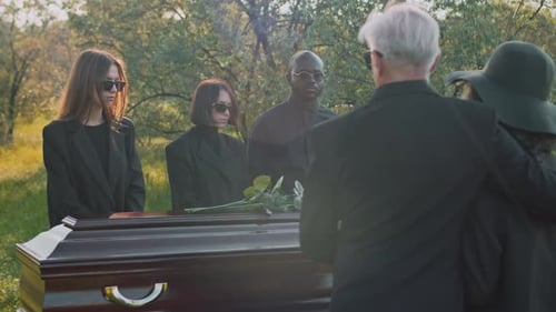 Family at Outdoor Funeral Ceremony