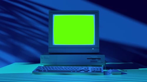 Retro 80s Style Old School Computer with Green Screen Technology Mockup Graphics