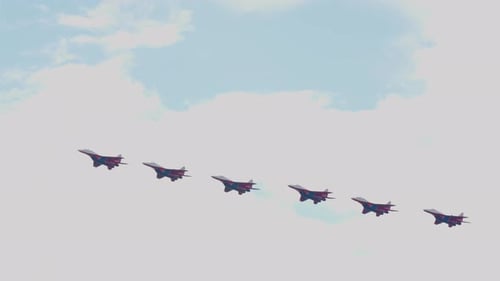 Formation of Six Fighter Jets Flying in Formation