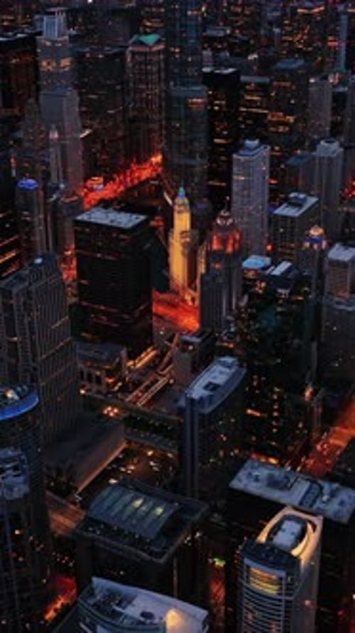 Aerial view of illuminated Chicago skyline at night