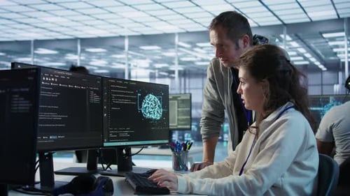 Team Working on Code in Modern Office