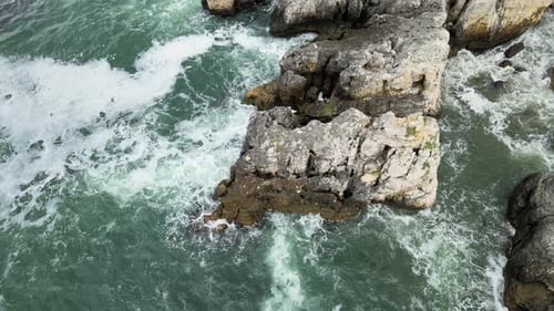 aerial sea waves rocks