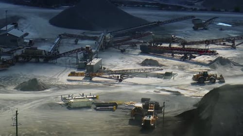 Aerial View of Heavy Equipment at Industrial Quarry