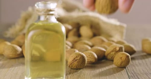 Almond oil composition used for cosmetics, spa, wellness centers. Perfect body oil and moisturizin