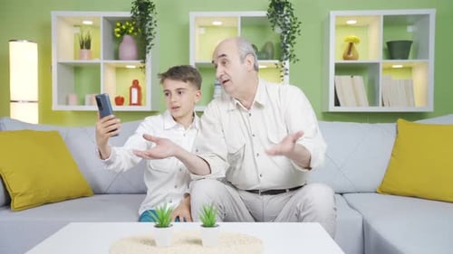 Grandson and Senior Video Chat at Home