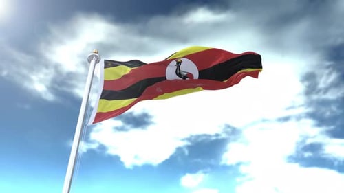 Uganda Flag Waving Against Cloudy Blue Sky with Sunlight