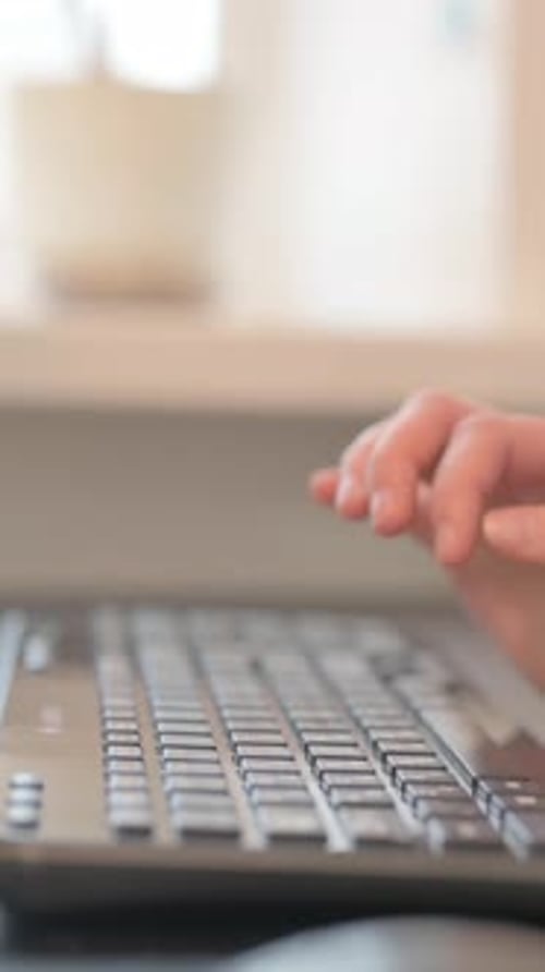 Close up of Female Hands Typing on Computer, vertical video
