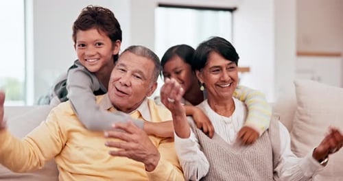 Grandparents Enjoying Time with Grandchildren at Home