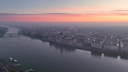 Aerial view of Hungarian Parliament Building at sunrise with the Danube river, in Budapest, Hungary