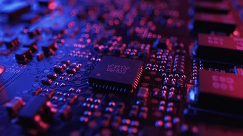 Focus on a Microchip, CPU Processor. Printed Circuit Board / Computer Motherboard with Components: