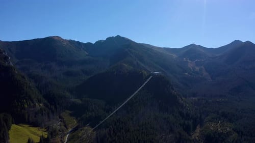 Lift cabins in a mountain ski resort. The movement of ski lifts.