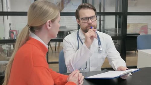 Close up of Doctor Listening Female Patient