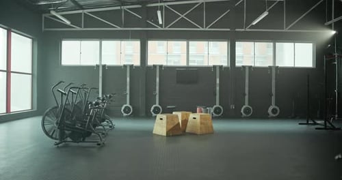 Empty, equipment and machine in gym for workout, exercise and fitness for wellness in health club