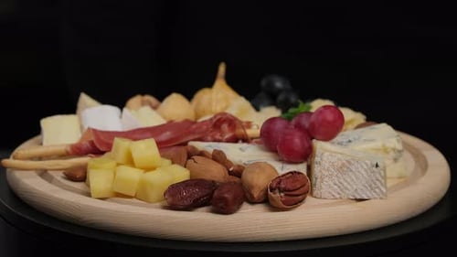 Rotating Charcuterie Board with Cheese and Fruit