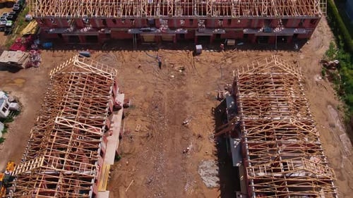 Aerial View of New House Construction Project in Suburban Area