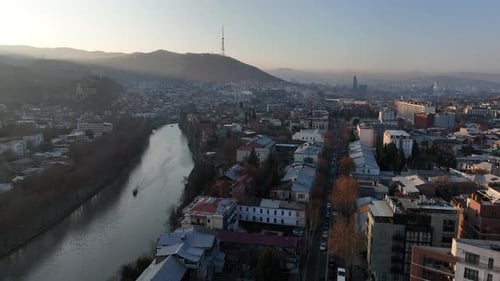 Aerial view of center of Tbilisi under Mtatsminda mountain, Georgia 2022