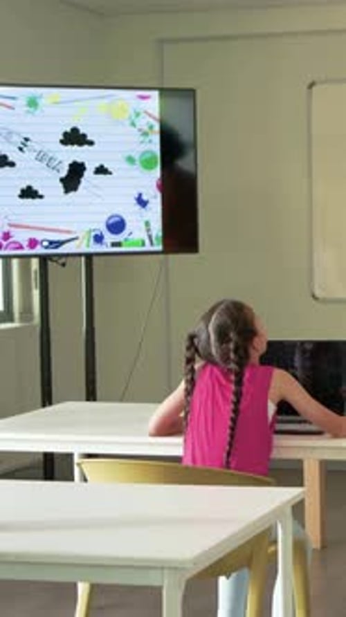 Vertical video: Reaching girl pink top watching teacher entering classroom holding laptop to learn