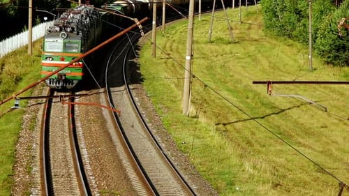 Freight train transporting cargo on railway tracks a modern industrial view