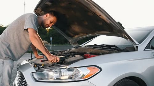 Frustrated Businessman Repairing Accident Car. Vehicle Check Engine Damage Troubles