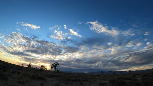 Dynamic cloudscape of the harsh climate of the Mojave Desert landscape - wide angle time lapse