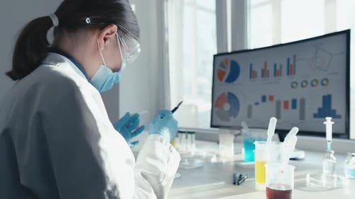 Scientist Conducts Lab Experiment with Scientific Equipment