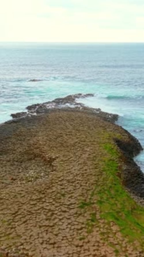 Travelling social ratio aerial video of The Giant's Causeway in Bushmills, Northern Ireland, UK