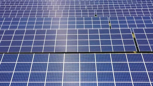 Closeup of surface of blue photovoltaic solar panels for producing clean ecological electricity. Pro