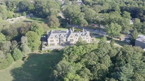 Mansion in Long Island NY during the summertime, green scenery