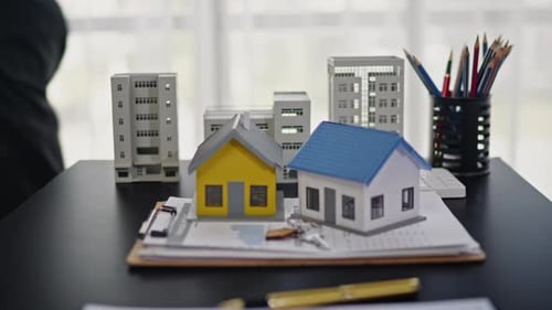 Businesspeople sell buy mortgage and signing agreement for apartment financial