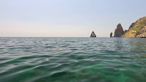 Sea Water Surface Background Low Angle View From Kayak Camera Flies Over the Clear Green Sea Water